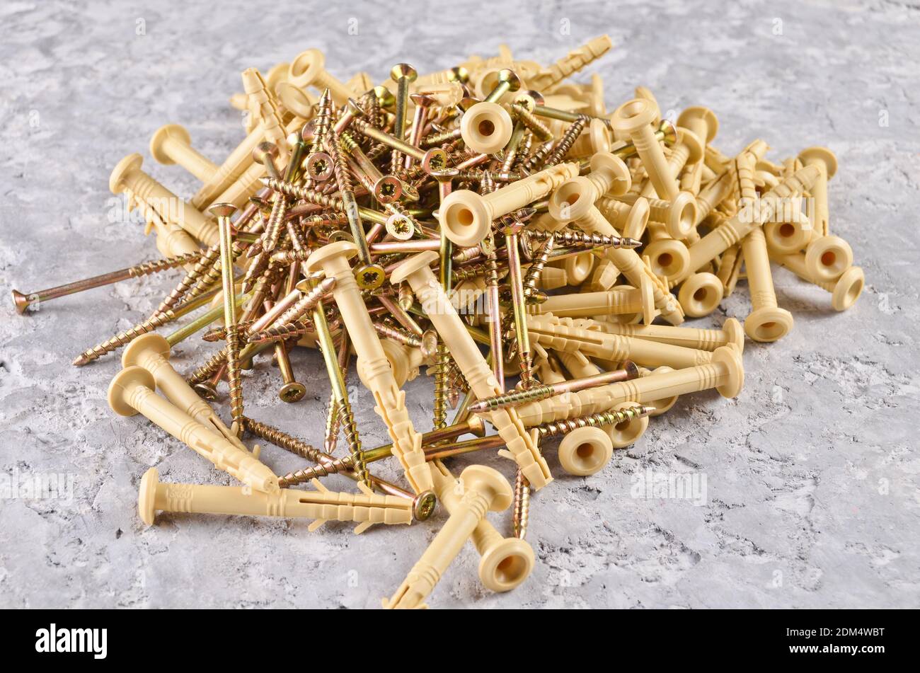 dowel screws on a concrete surface Stock Photo Alamy