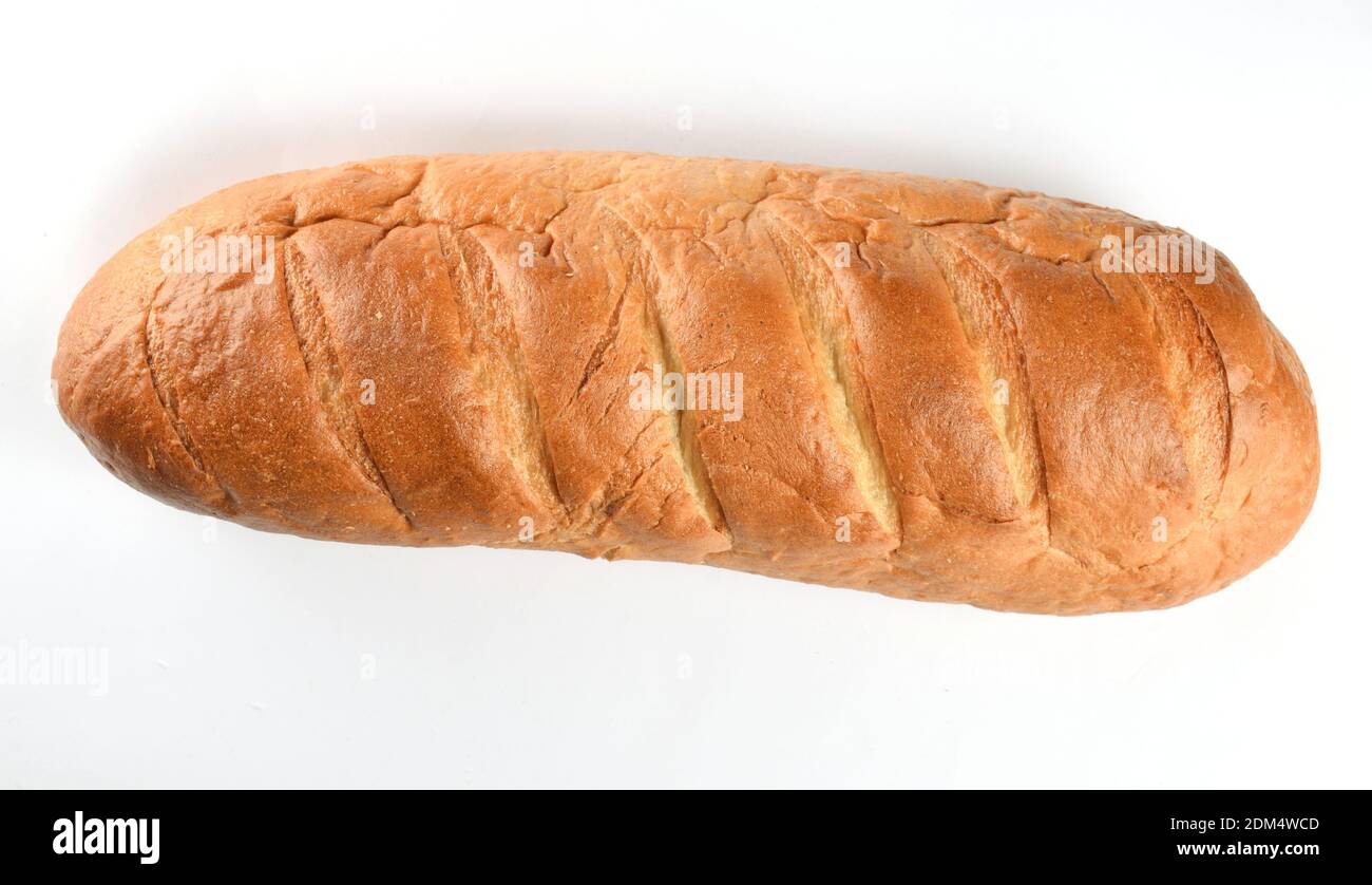 A loaf of wheat bread isolated on white background Stock Photo - Alamy