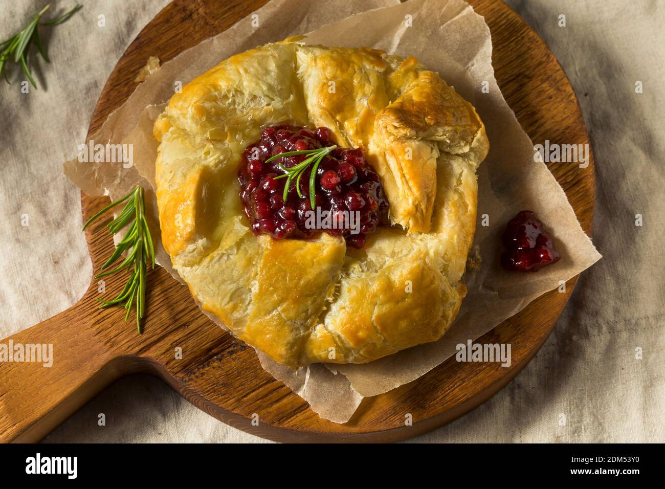 Homemade Baked Brie in Puff Pastry with Lingonberry Stock Photo