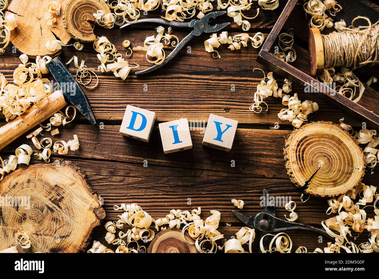 DIY wood. Woodworking workshop. Wood shavings and carpentry tools. background Stock Photo