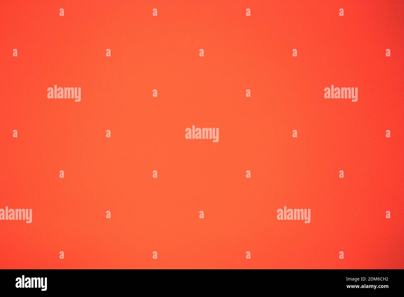 Dark orange background with some texture and copy space Stock Photo