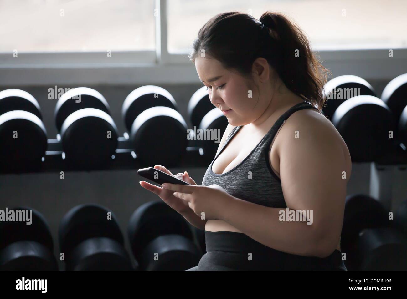 Young Asian Fat Fitness Woman Using Smartphone And Relaxing In Gym Sport Overweight Girl Taking A Break After Exercises Workout Obese Female Resting Chubby Give Up Lifestyle Stock Photo Alamy Young Asian Fat Fitness Woman Using Smartphone And Relaxing In Gym Sport Overweight Girl Taking A Break After Exercises Workout Obese Female Resting Chubby Give Up Lifestyle Stock Photo Alamy