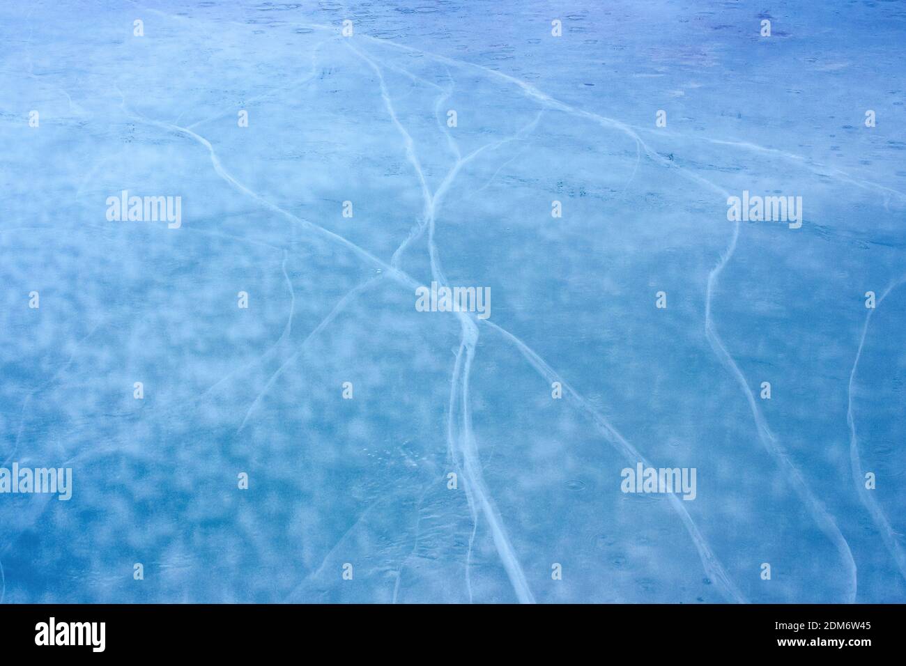 blue ice crack texture. frosty outdoor background in winter Stock Photo