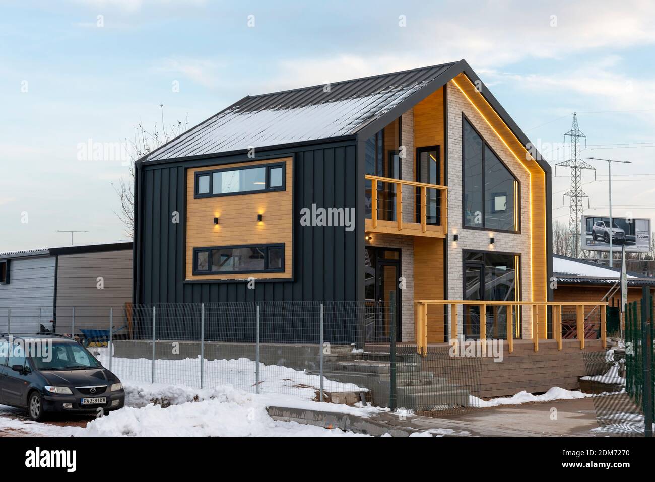 Wooden timber frame prefabricated cabin or prefab house under construction as modular housing and flat pack homes concept. Stock Photo