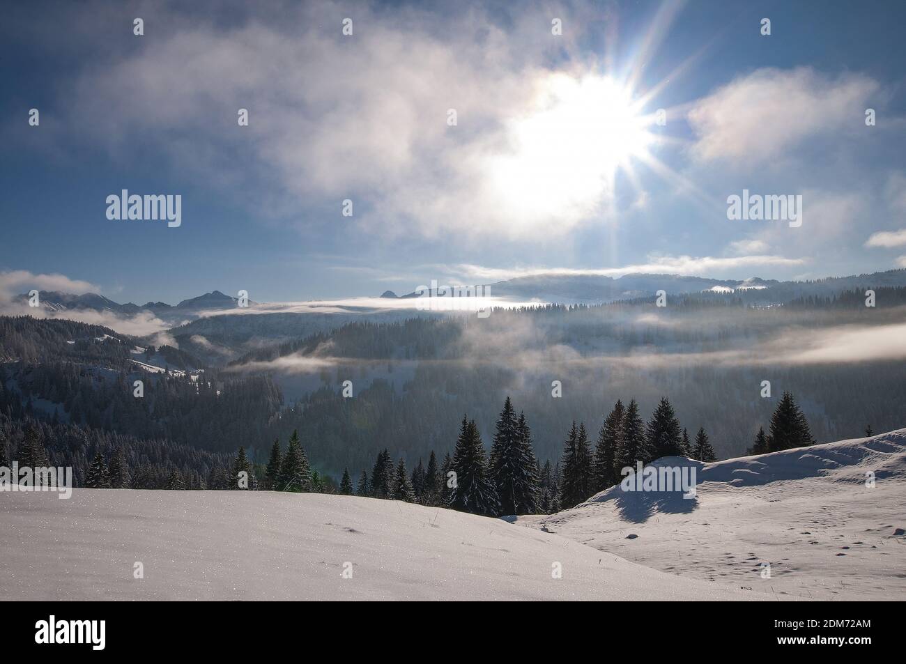 View from the Mittelalpe above the Riedbergpass to the Kleinwalstertal mountains, below the sun the Hohe Ifen (2230 m), Allgäu, Swabia, Bavaria, Germa Stock Photo