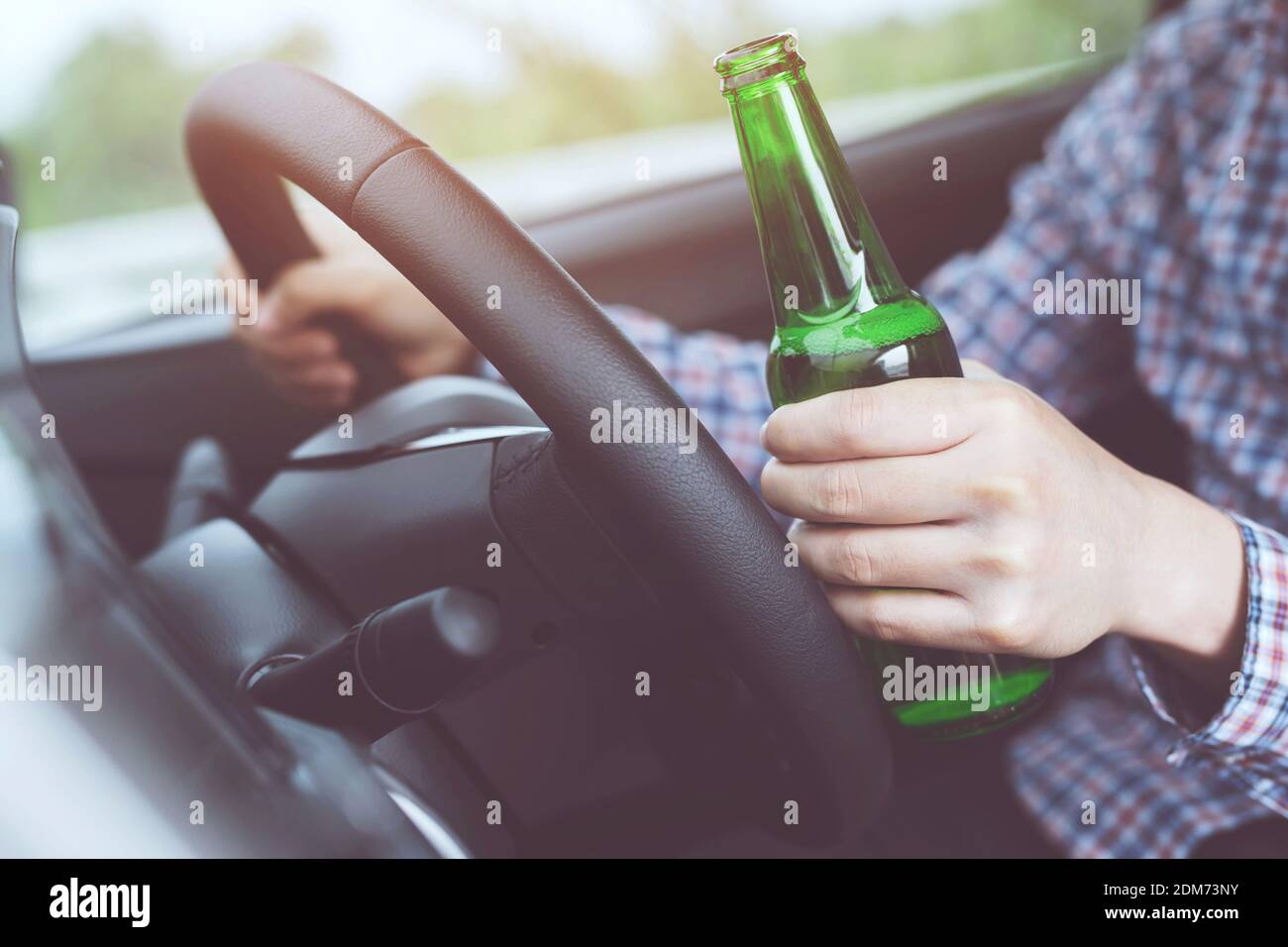 Hand Holding Beer Bottle Driving High Resolution Stock Photography and ...