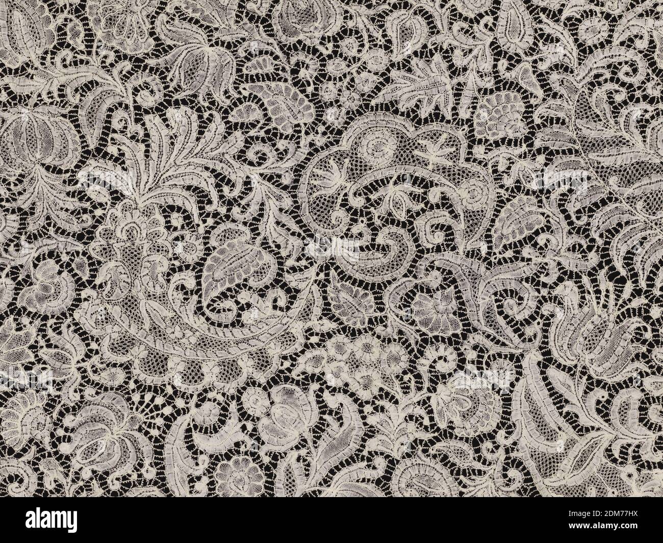 Flounce, Medium: linen Technique: Brussels-style bobbin lace, Flounce worked in an allover design of various types of leaves, terminating in small scrolls and many varieties of flowers., Belgium, 17th century, lace, Flounce Stock Photo