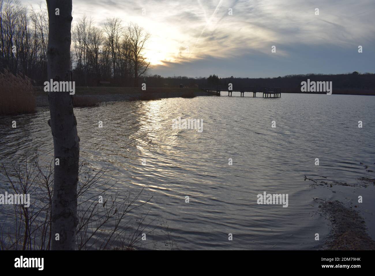 Dramatic sunset as clouds drift away after a rainy day over Helmetta