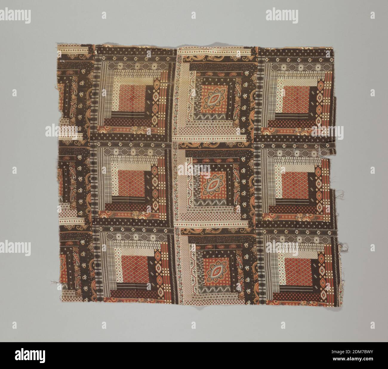 Textile, Medium: cotton Technique: printed by engraved roller on plain weave, Two fragments of printed cotton imitating patchwork: rows of squares of two types each traditionally called 'log cabin' in a stepped arrangement of bars enclosing a central square. Each shape has a small scale dotted or floral pattern (several Indian Paisley type) in dark browns and rust-reds., USA, 1880s, printed, dyed & painted textiles, Textile Stock Photo