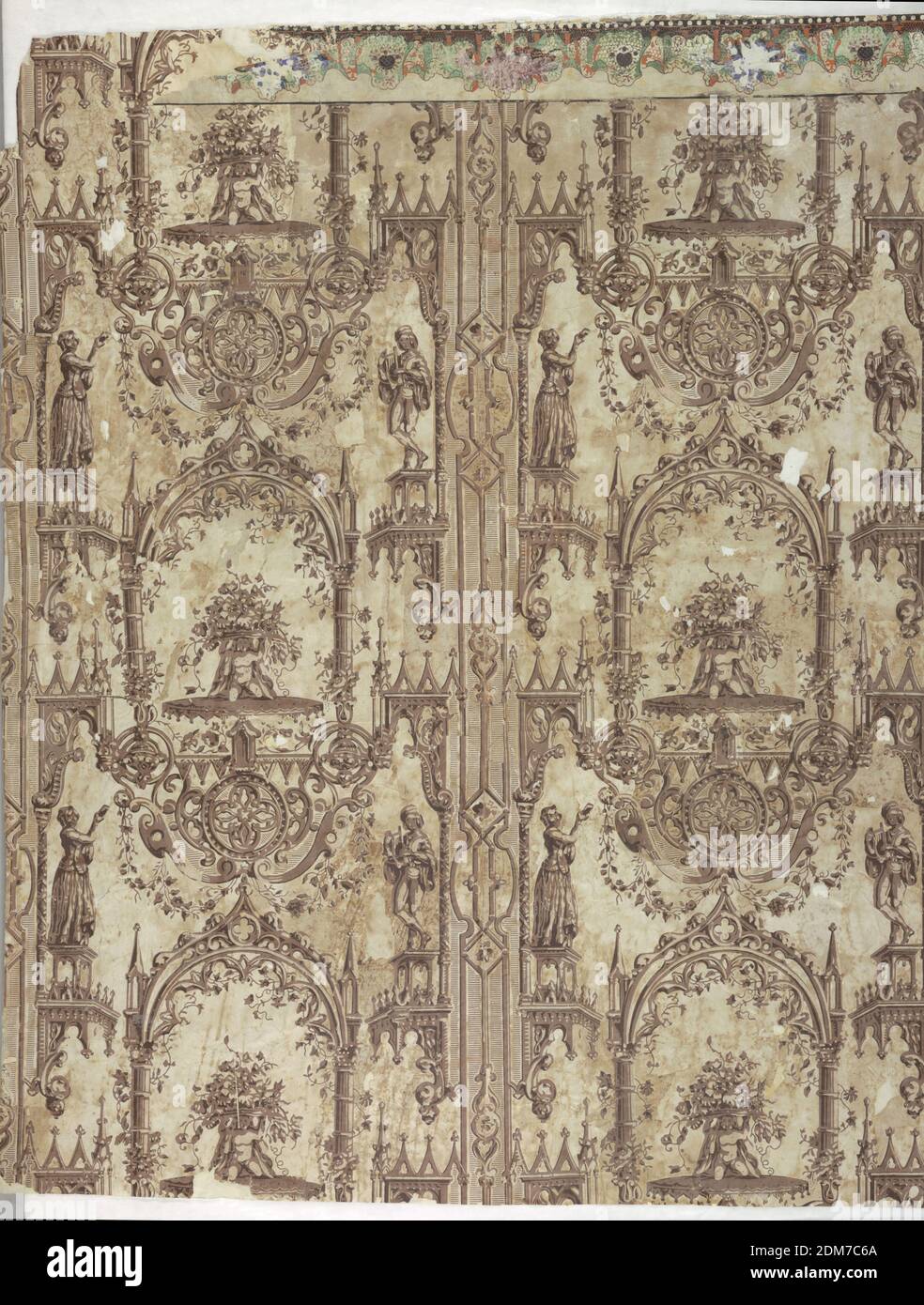 Sidewall, Block-printed on machine-made paper, satin ground, Gothic Revival pattern: a) patterned stripes run along edge of paper, half the stripe being printed along each edge to form a whole when hung: Gothic brackets project from the edging stripes to support on left, woman on right man playing lyre. In center: Gothic arch frames putto holding large dish of flowers, supported by fantastic concoction of gothic ornament. Block printed in black, brown, and what now appears to be white, but where protected by border appears peachy-pink, on white satin ground; b) Simulation of gathered lace Stock Photo
