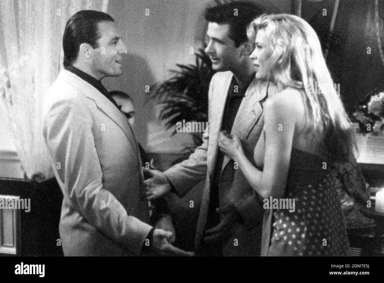 Los Angeles.CA.USA. Armand Assante, Kim Basinger and Alec Baldwin    in ©Hollywood Pictures film, The Marrying Man (1991)  Director: Jerry Rees Writer:  Neil Simon Source: Rudyard KiplingÕs poem with same title Note: Also known as Too Hot to Handle in the UK and Australia Ref:LMK106-SLIB181120-003 Supplied by LMKMEDIA. Editorial Only. Landmark Media is not the copyright owner of these Film or TV stills but provides a service only for recognised Media outlets. pictures@lmkmedia.com Stock Photo