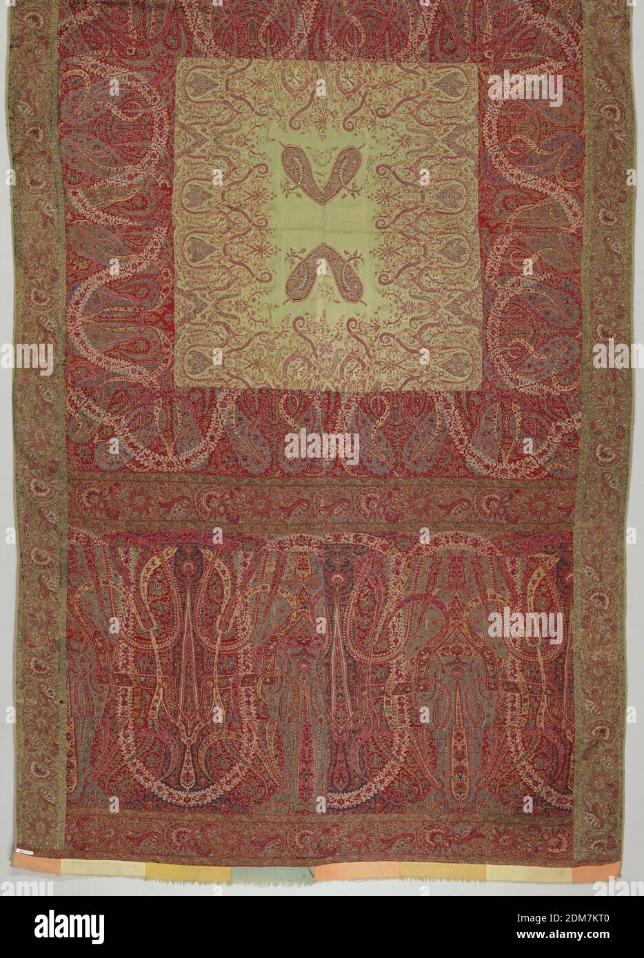 Shawl, Medium: wool Technique: twill tapestry weave, pieced Label: wool twill tapestry, pieced together, Shawl with large-scale leaves. Center in light green with repeated almond shapes in pairs surrounded by floral elements. Center enframed by four outer borders of varying widths. Predominantly red and green., India for European market, 1830–1850, woven textiles, Shawl Stock Photo