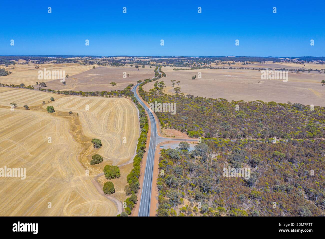 Road running through hinterland of Western Australia Stock Photo