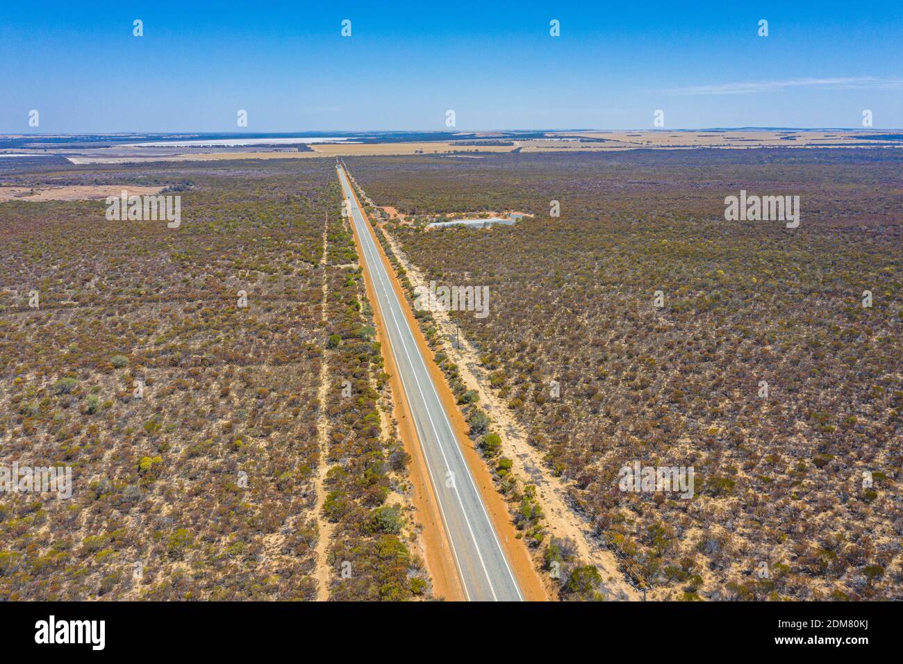 Road running through bushes of Western Australia Stock Photo - Alamy