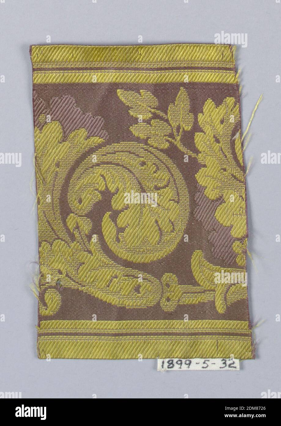Trimming fragment, Medium: silk Technique: woven, Scrolling leaf in yellows on plum ground., France, ca. 1830, woven textiles, Trimming fragment Stock Photo