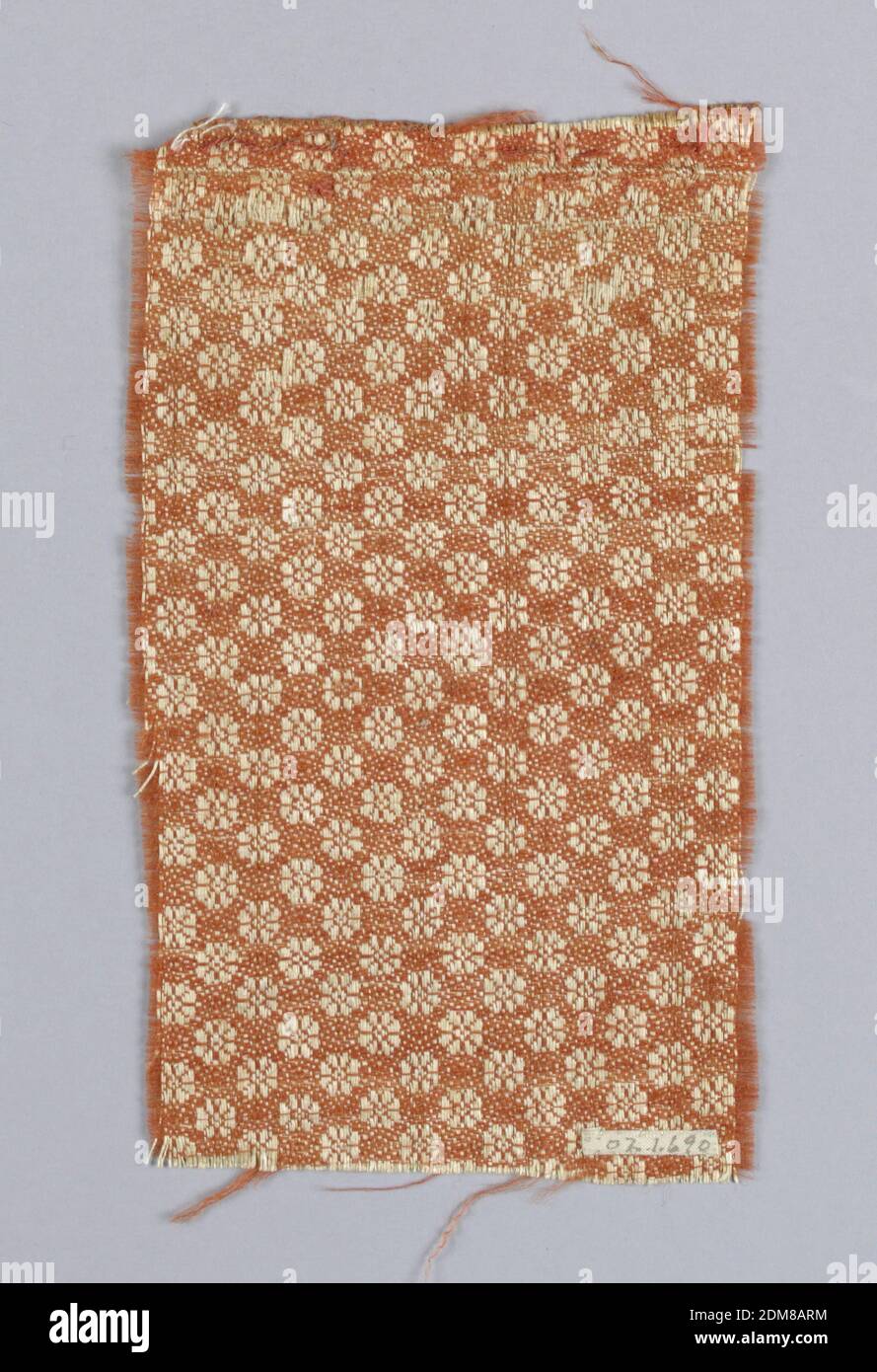 Fragment, Medium: wool, linen Technique: plain weave with floats, Simple floral forms in orange and white reversible fabric., Spain, 17th century, woven textiles, Fragment Stock Photo