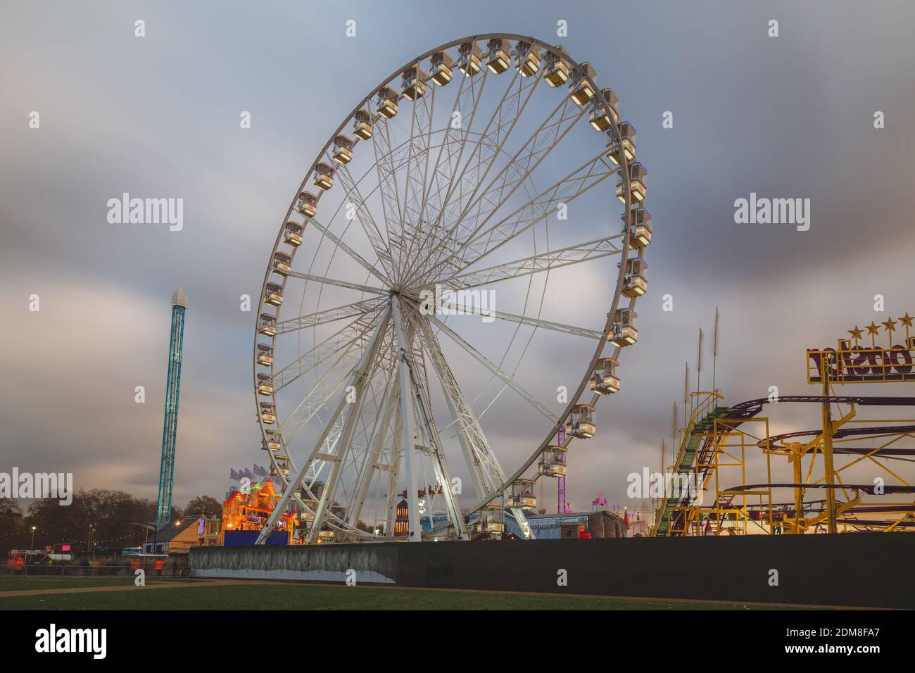 Amusement park rides at Hyde Park Winter Wonderland, London's annual Christmas market. Stock Photo