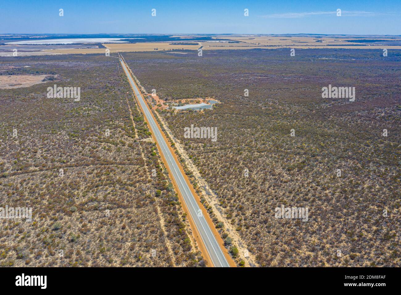 Road running through bushes of Western Australia Stock Photo