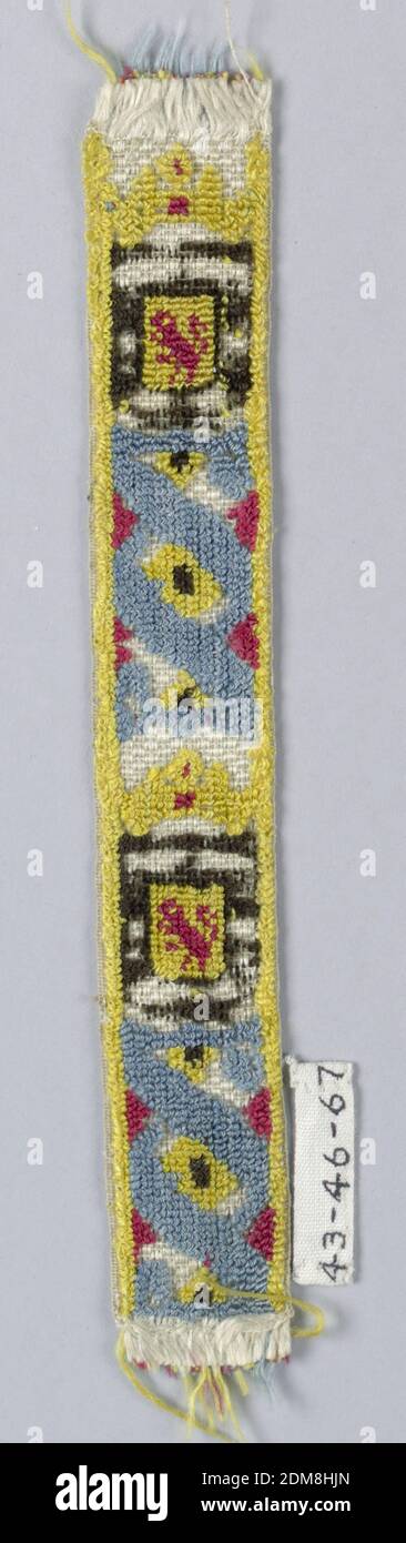 Trimming, White and colored silk in uncut voided velvet weave., Crowned shield showing a lion rampant, red, yellow, and black; alternating with an ornament composed of interlacing band in blue with dots in red and yellow., Spain, early 19th century, trimmings, Trimming Stock Photo