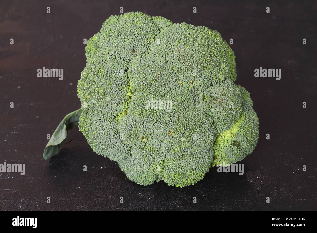 Broccoli isolated on black background. Raw broccoli vegetable close up Stock Photo