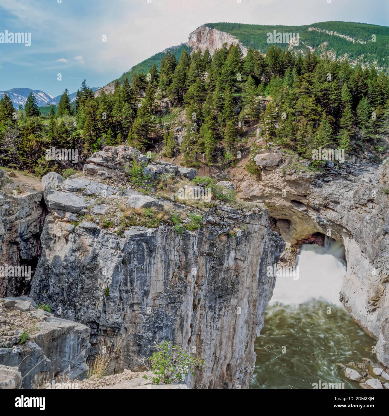 boulder river natural bridge falls in the absaroka range near big