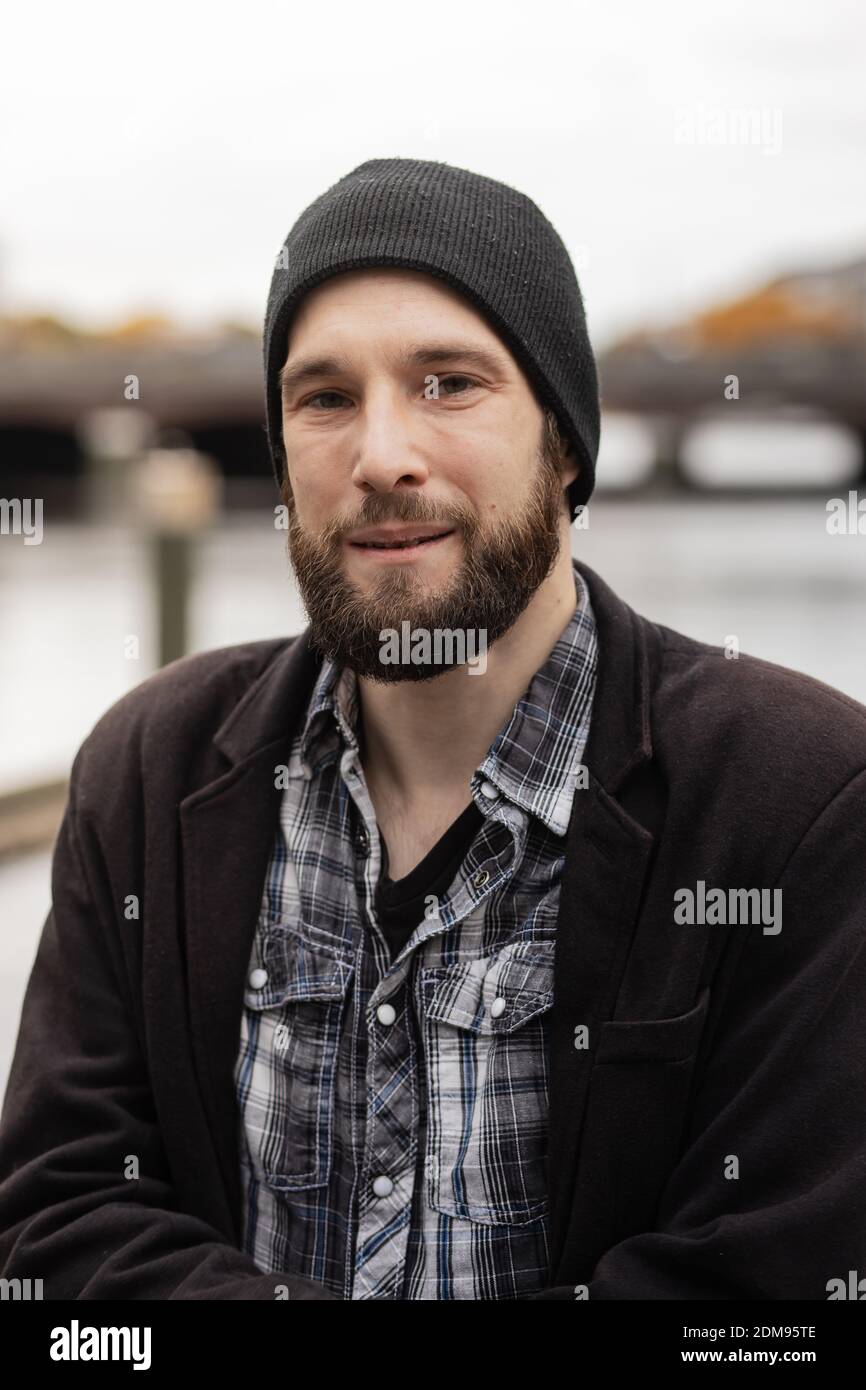 Man in black cap hi-res stock photography and images - Alamy