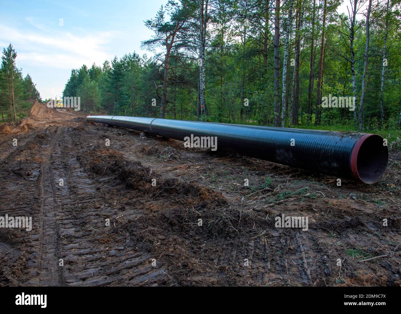Crude oil and Natural gas pipeline construction work in forest area ...