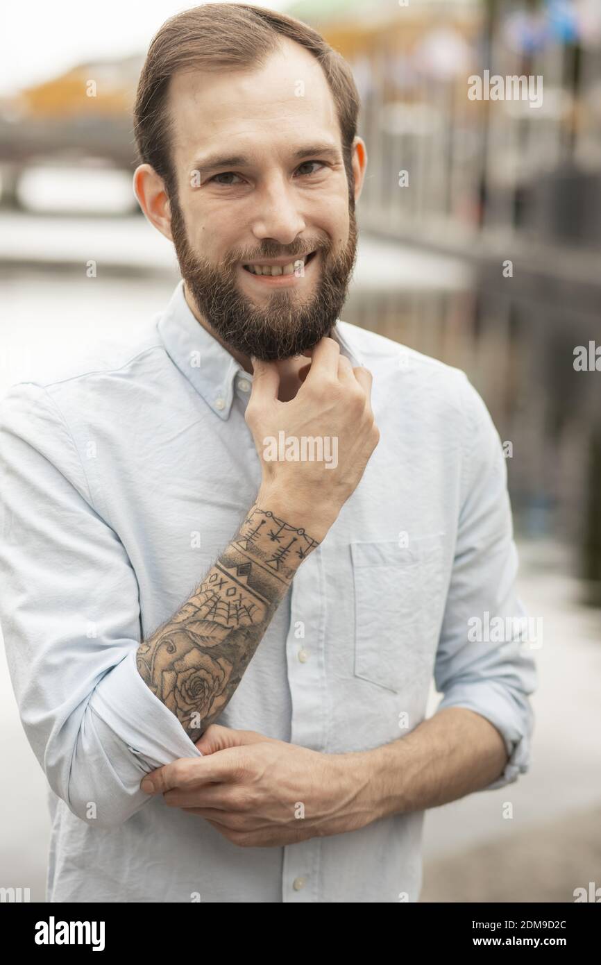Young man with a tattoo hi-res stock photography and images - Alamy