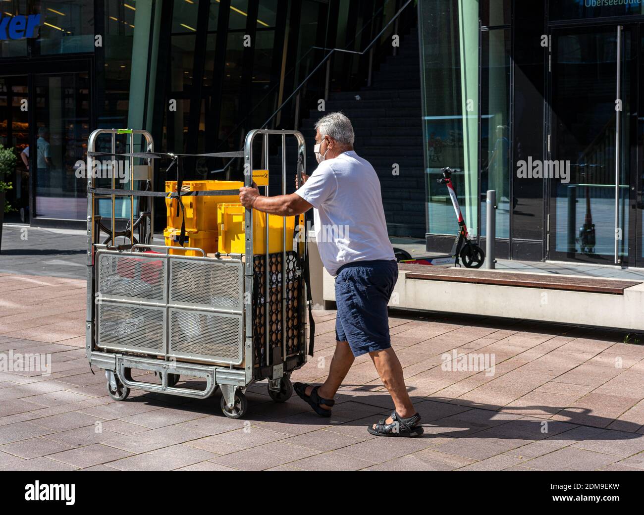 A Man Delivers Goods Stock Photo