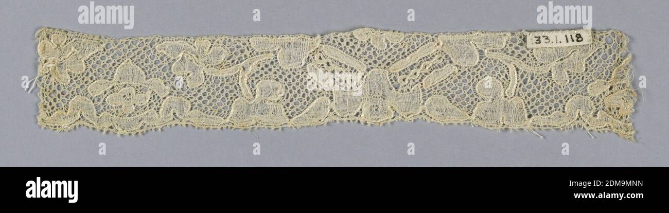 Fragment, Medium: linen Technique: bobbin lace, Mechlin style with five hole ground, Belgium, 18th century, lace, Fragment Stock Photo