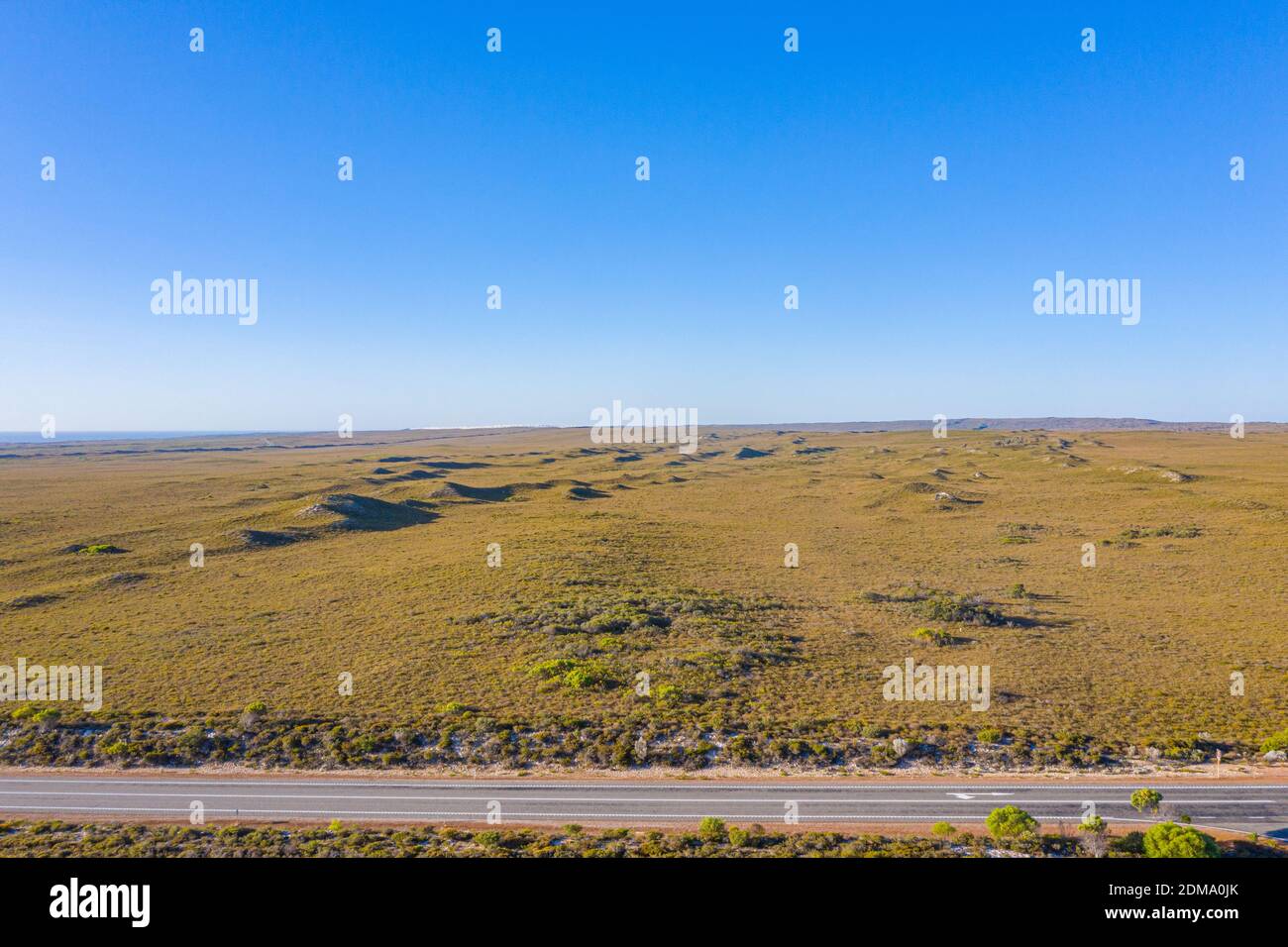 Road running through bushes of Western Australia Stock Photo - Alamy