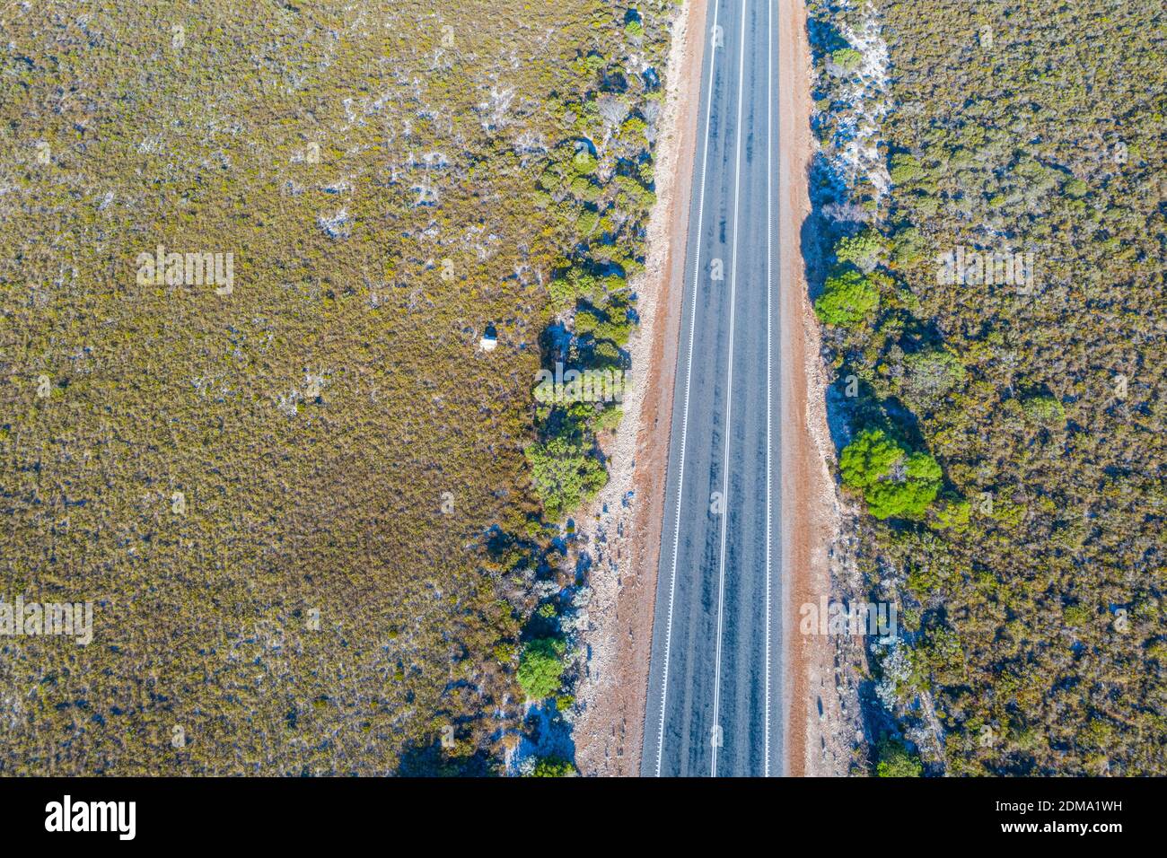 Road running through bushes of Western Australia Stock Photo - Alamy