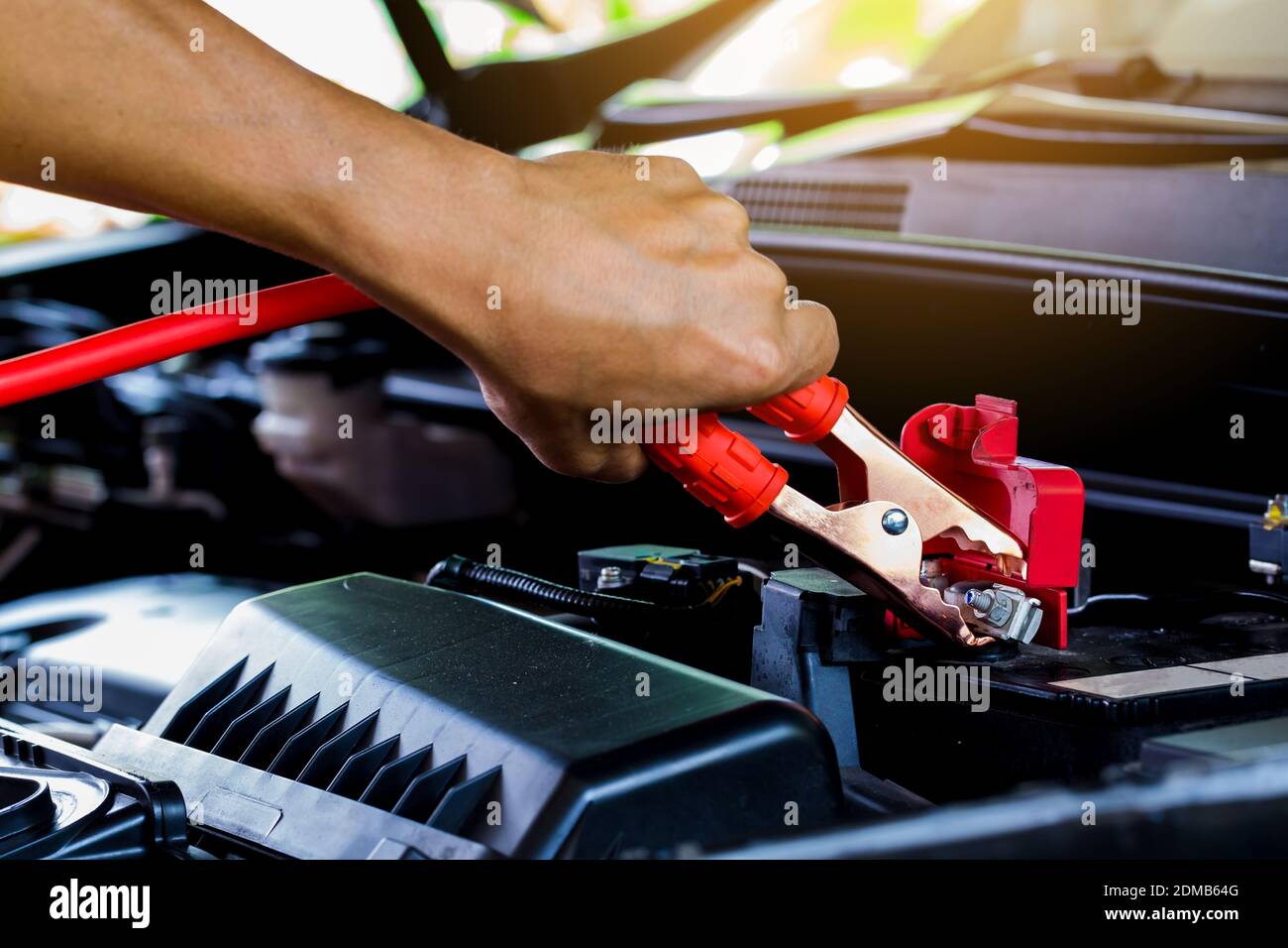 selective focus charging car with electricity trough cables. first