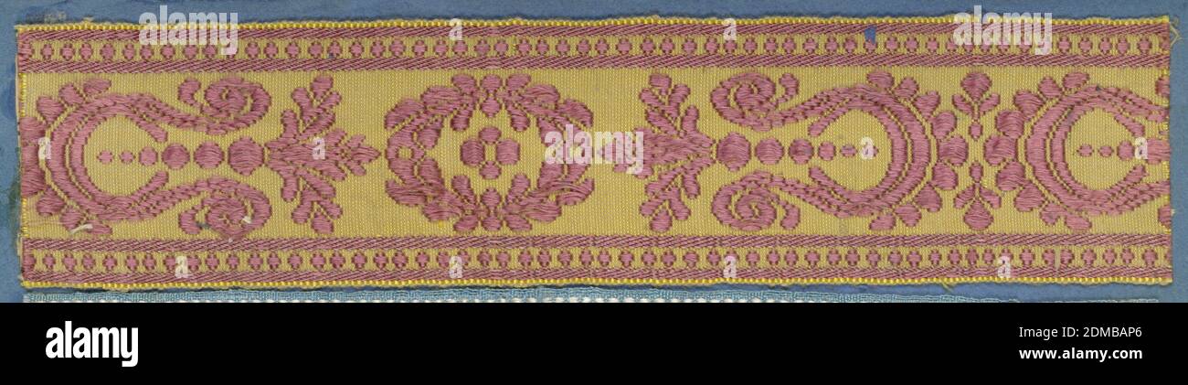Trimming, Medium: silk Technique: woven, Trimming fragment in a design of alternating ornaments comprised of leaves, scrolls and dots in mauve on a yellow ground., France, 19th century, trimmings, Trimming Stock Photo
