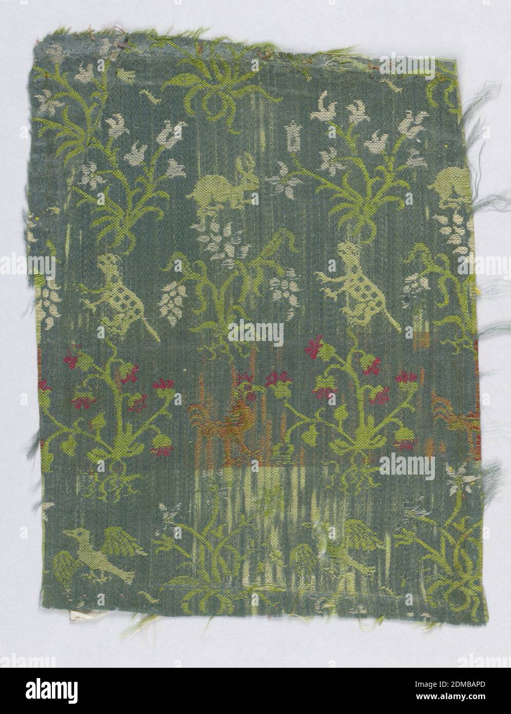 Fragment, Medium: silk Technique: 7&1 satin patterned by complementary wefts, Small animals, plants and birds on a blue background., 17th century, woven textiles, Fragment Stock Photo