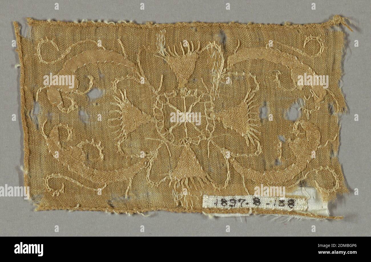 Fragment, Medium: linen Technique: applique and embroidery, Light brown rectangular fragment in a conventionalized design of a circle with spokes surrounded by scrolling bands and triangles that suggest floral forms., Belgium or France, early 17th century, embroidery & stitching, Fragment Stock Photo