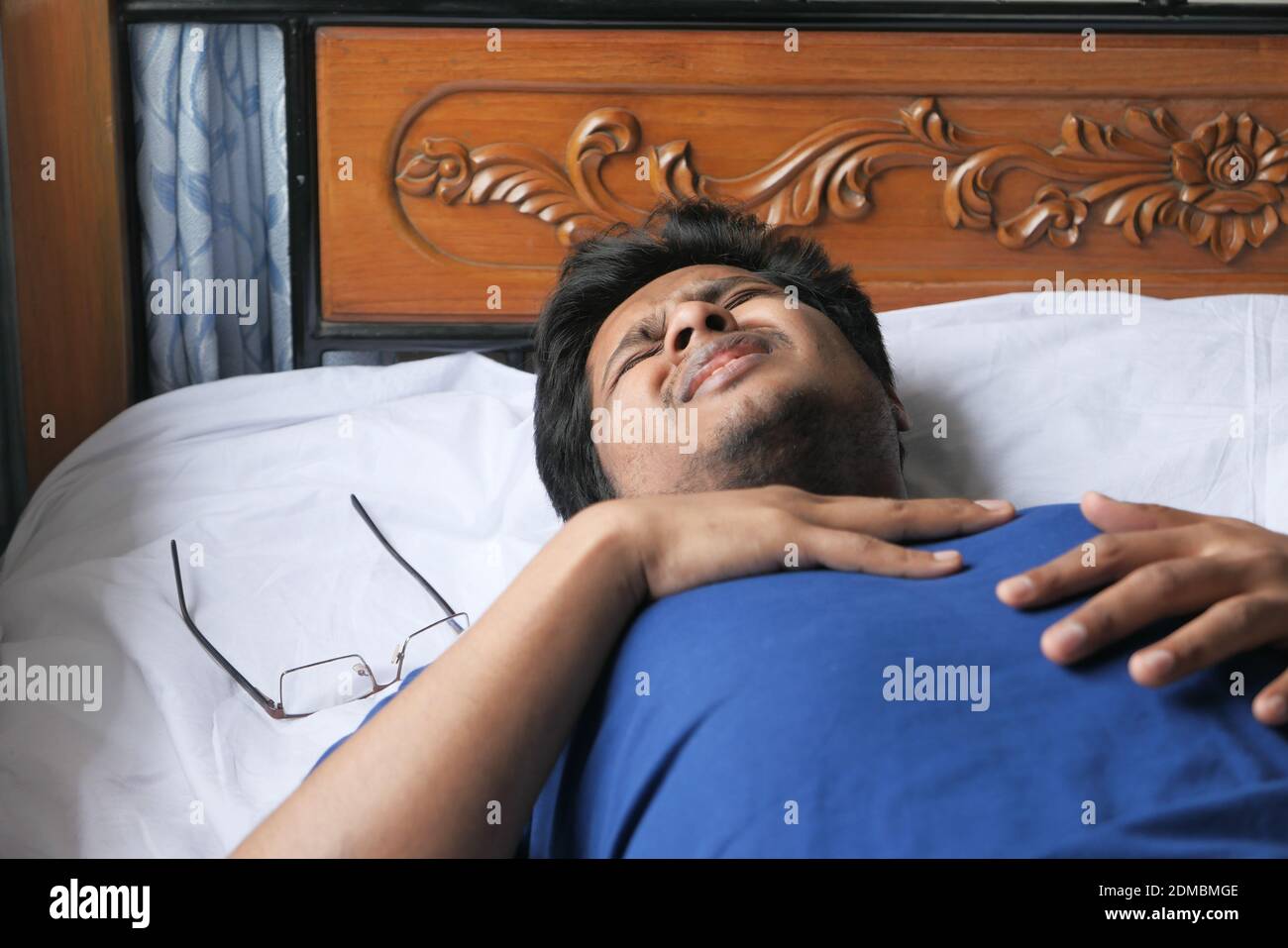 Man chest pain bed hires stock photography and images Alamy