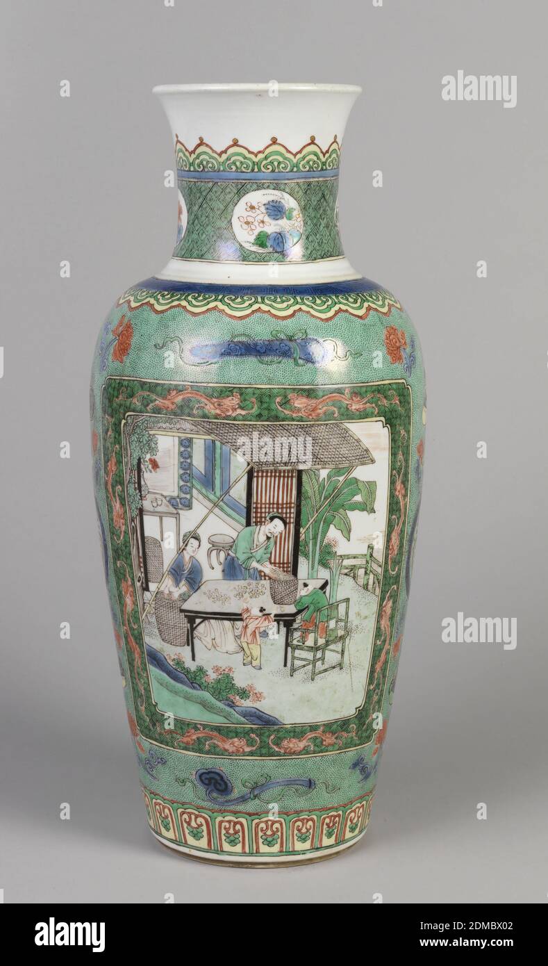 Vase, Enameled and glazed porcelain, Designed with 'famille verte' decoration. Tall oviform vase with flared neck; the sides with two oblong reserves depicting figures harvesting tea; in a speckled green ground with vases and lotus blossoms centering character medallions; the neck with small floral reserves in a latticed green ground., China, 17th–18th century, ceramics, Decorative Arts, Vase Stock Photo