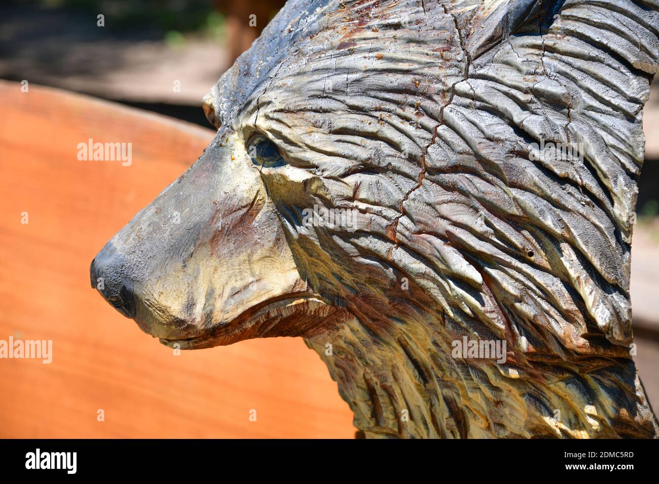 Public art. Wolf carved from tree trunks at Kentucky Down Under