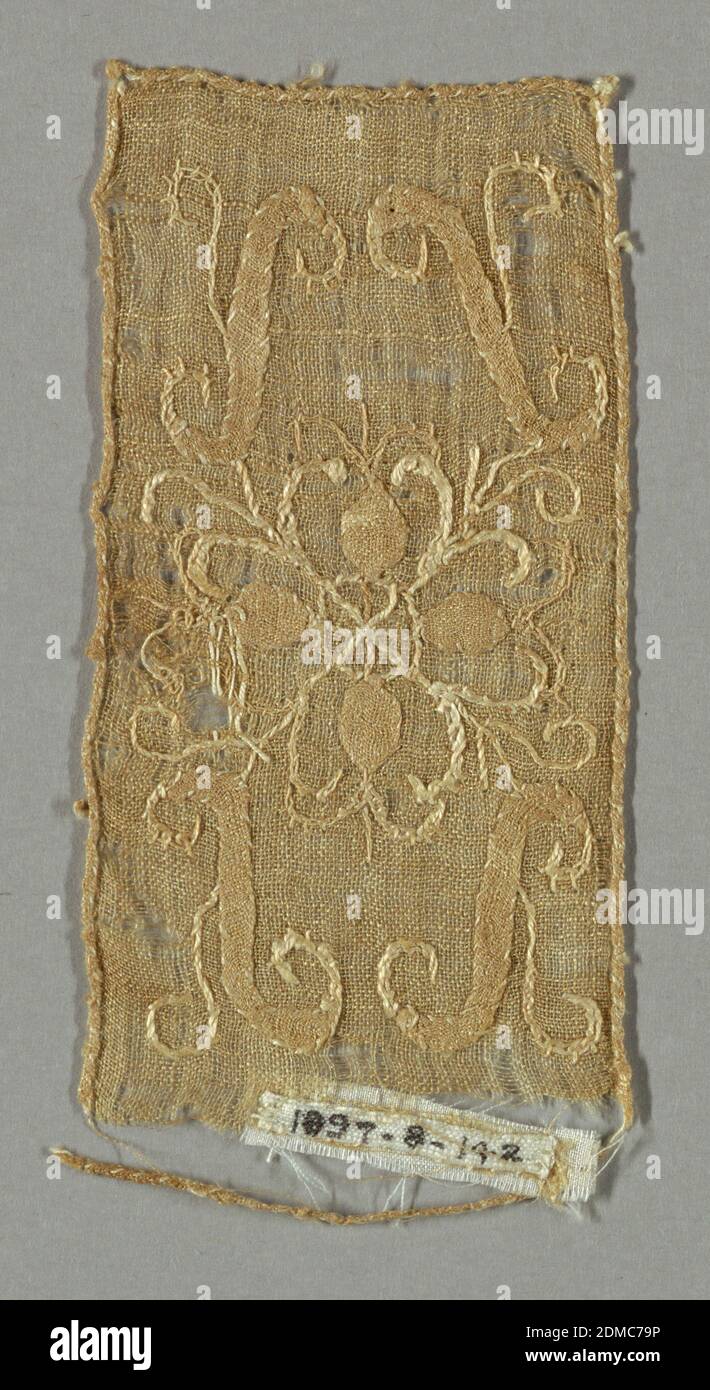 Fragment, Medium: linen Technique: applique and embroidery, Light brown rectangular fragment with a conventionalized design of a spoked circle surrounded by petals and scrolling bands and lines., Belgium and France, early 17th century, embroidery & stitching, Fragment Stock Photo