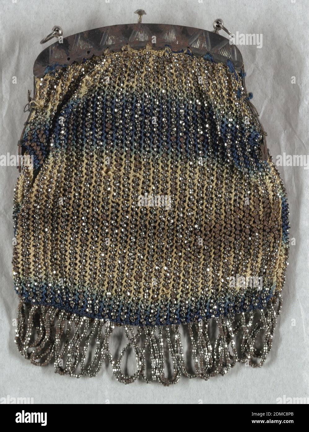 Purse, Medium: silk, steel beads, steel frame Technique: crochet with beadwork, Ladies' purse worked in crochet in blue and tan silk with vertical stripes of steel beads and looped fringe at the bottom. Steel frame for opening., USA, mid-19th century, costume & accessories, Purse Stock Photo