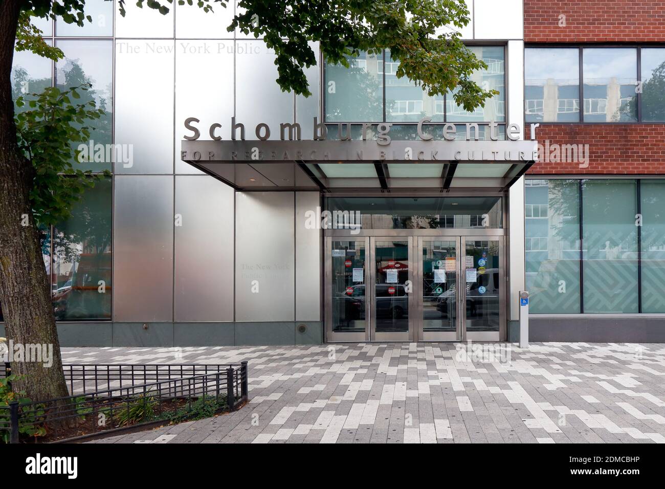 Schomburg Center for Research in Black Culture, New York Public Library, 515 Malcolm X Blvd, New York, NY. exterior storefront of a library in Harlem Stock Photo