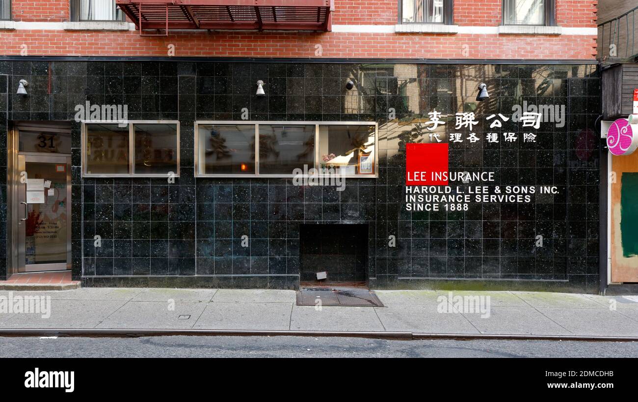 Harold Lee & Sons Inc, 31 Pell St, New York, NYC storefront photo of an insurance agency in Manhattan Chinatown. Stock Photo