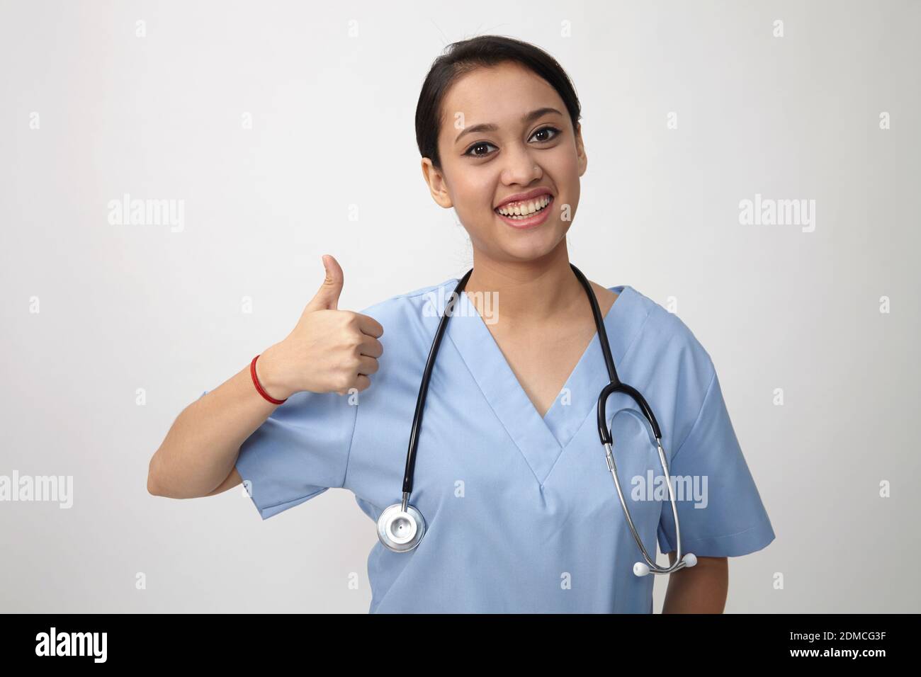 Indian Woman Doctor Thumbs Up High Resolution Stock Photography and ...