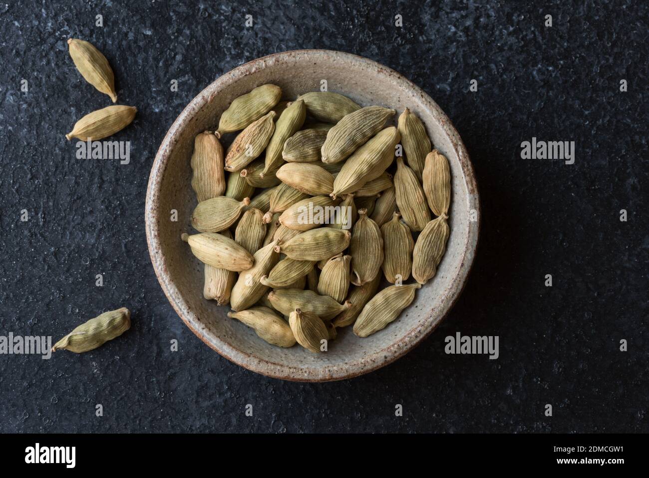 Directly Above Shot Of Cardamoms In Bowl On Table Stock Photo