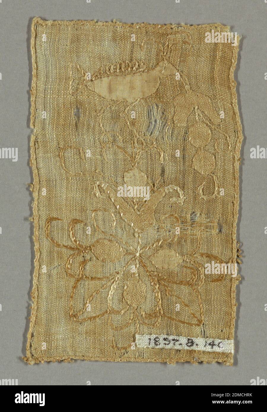 Fragment, Medium: linen Technique: applique and embroidery, Light brown rectangular fragment with a conventionalized design of a bird with a leaf and foliated floral forms., Belgium or France, early 17th century, embroidery & stitching, Fragment Stock Photo