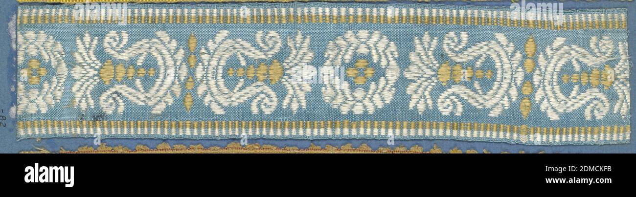 Trimming, Medium: silk Technique: woven, Trimming fragment in a design of alternating ornaments comprised of leaves, scrolls and dots in white and yellow on a blue ground., France, 19th century, trimmings, Trimming Stock Photo