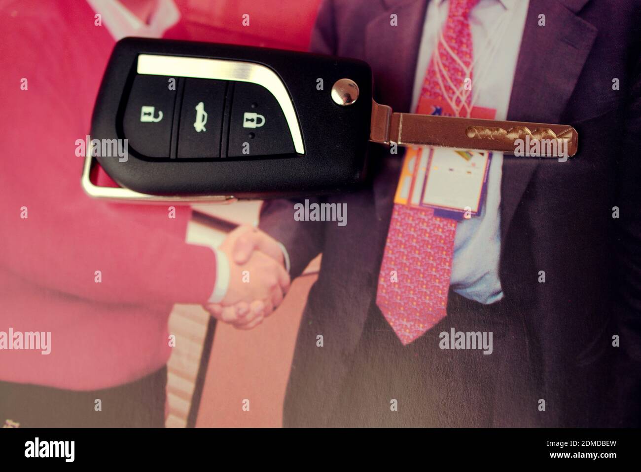 businessman holding a key Stock Photo