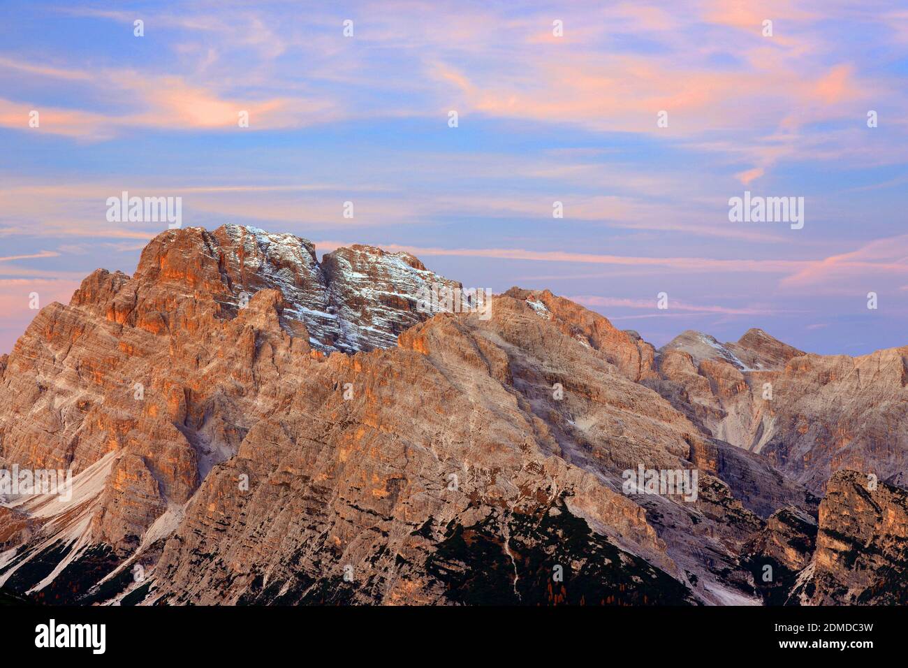 Rock Formation On Landscape Against Sky During Sunset Stock Photo