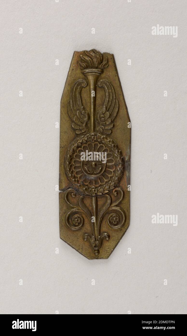 Mount, Brass, Vertical irregular polygon with repoussé decoration of a  patera with wings and a flaming torch and anthemion scrolls., Italy, early  19th century, metalwork, Decorative Arts, Mount Stock Photo - Alamy